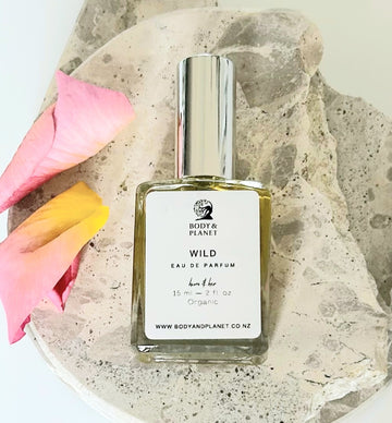 Natural Wild Perfume with warm vanilla, citrus grapefruit, floral ylang-ylang- Body and Planet